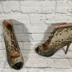 Zigisoho snakeskin lace up booties. New - never worn. Size 11